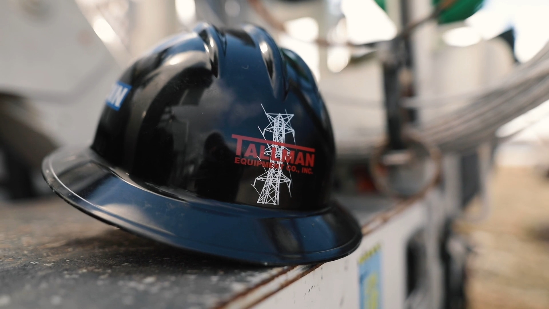 Tallman Equipment Co. Inc. hard hat on construction site