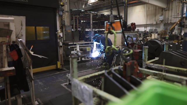 Man welding in factory photo